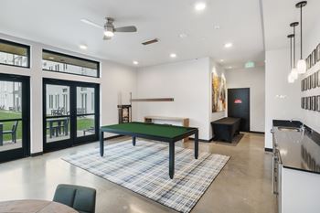 A modern living room with Billiards table